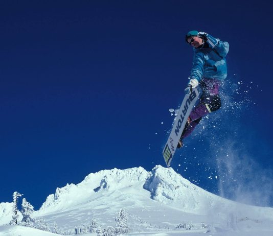 Kim Kardashian Shows Off Deep Cleavage In Plunging Top & Mini